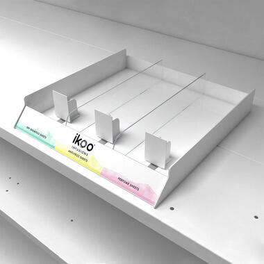 shelf display with pushers for cosmetics